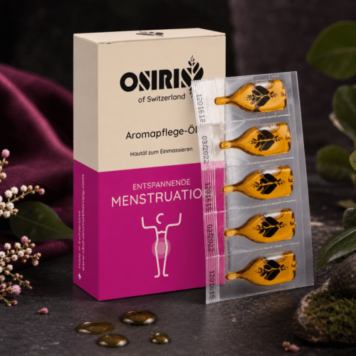 Osiris Aromapflege-Öl Entspannende Menstruation mit Verpackung und Ampullen in hochwertiger dunkler Produktinszenierung